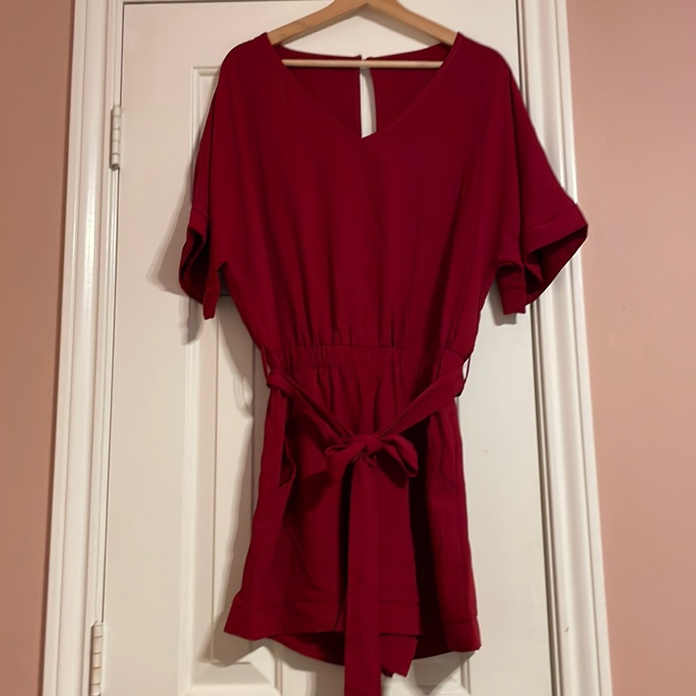 Dark red. Romper. Elastic waist. Pockets